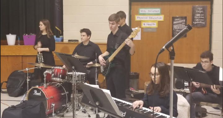 Jazz I Students spread holiday cheer in local primary schools